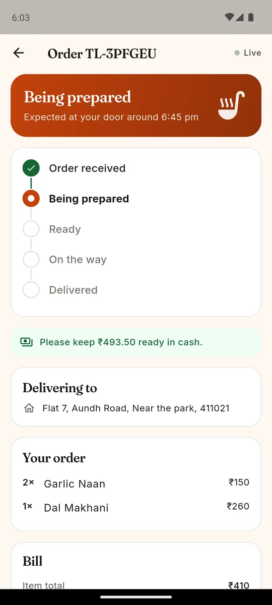 Live order screen in the Android app showing the order being prepared, a progress tracker and the cash amount to keep ready