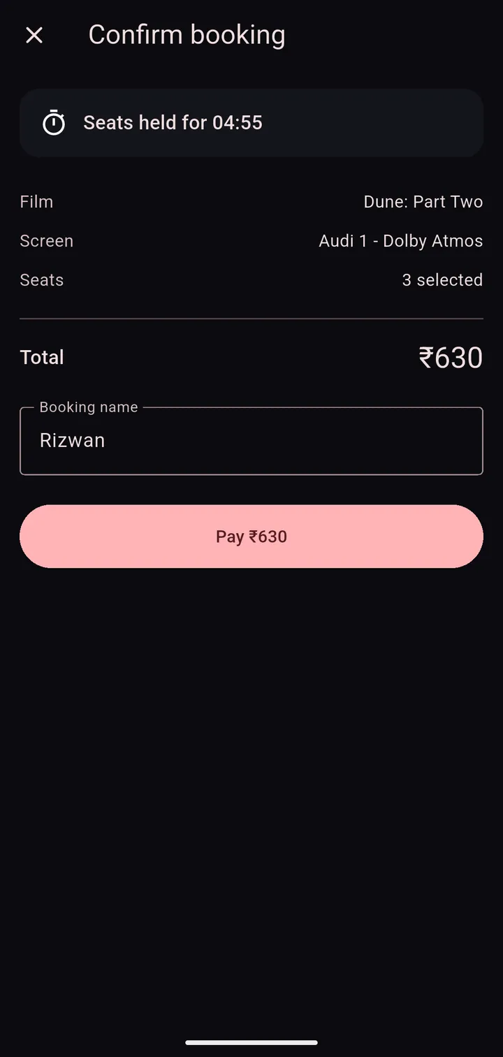 Confirm booking screen with a countdown showing the seats are held for 4 minutes 55 seconds and a Pay button